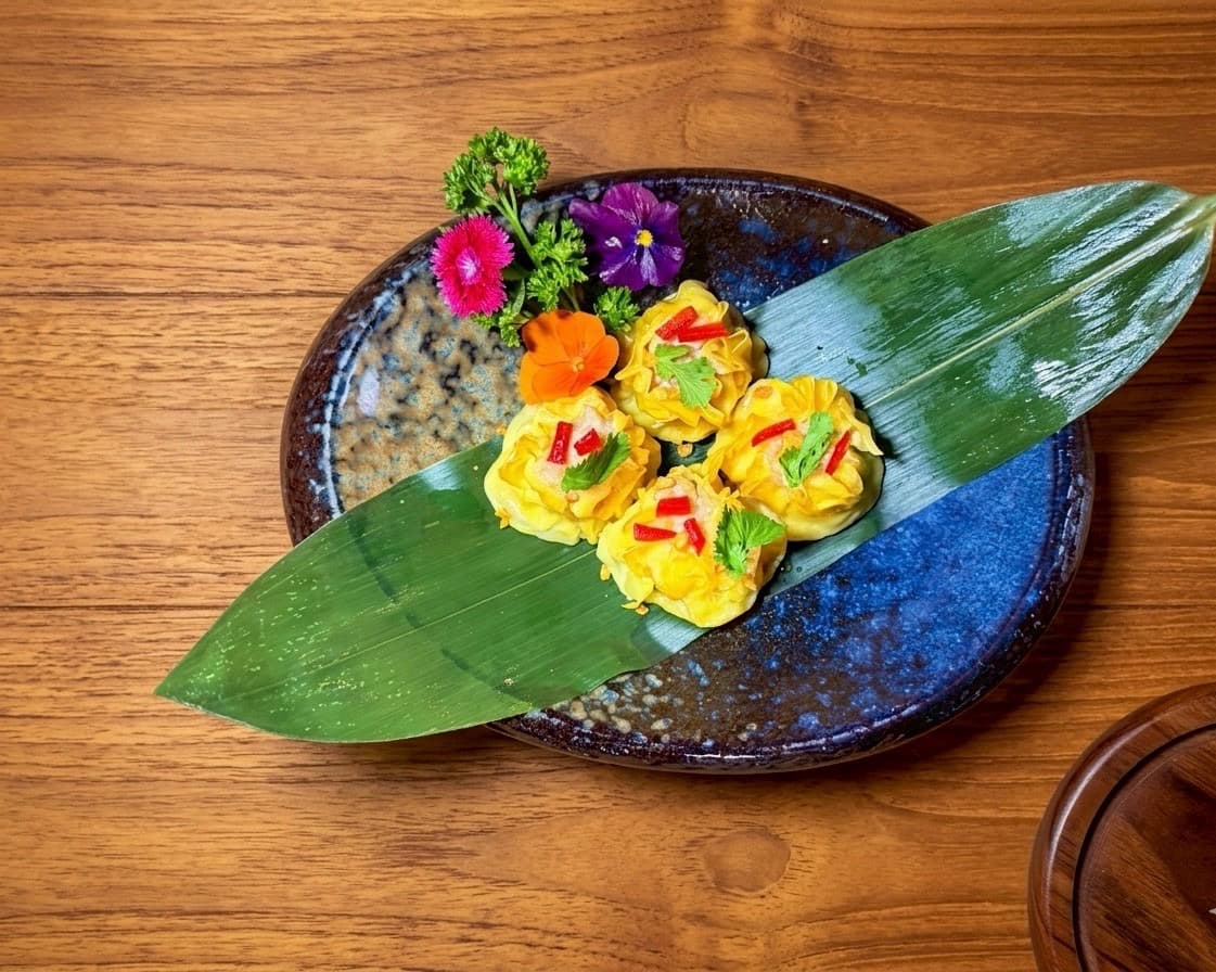 Hand-crafted Thai flower dumplings on banana leaf — Kruathai Atlanta
